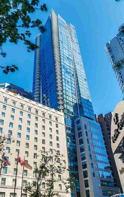 Glass residential towers above Georgia Street, downtown Vancouver